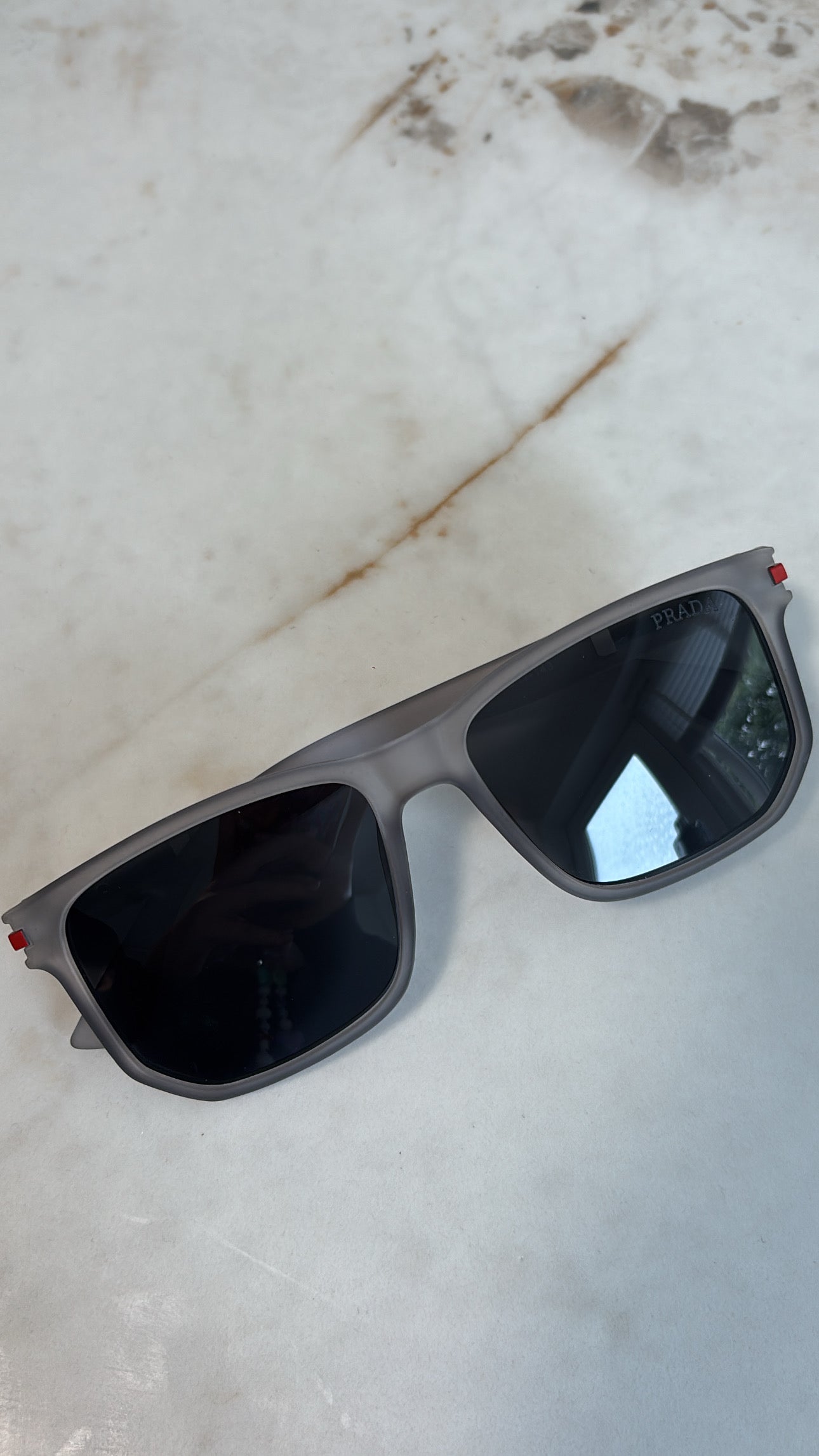 Men’s grey sunglasses