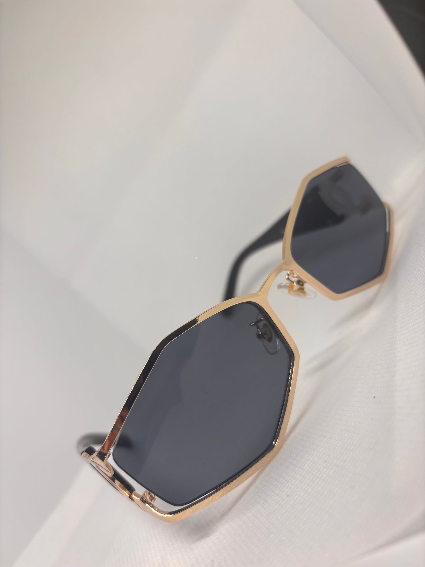 C BLACK AND GOLD SUNGLASSES
