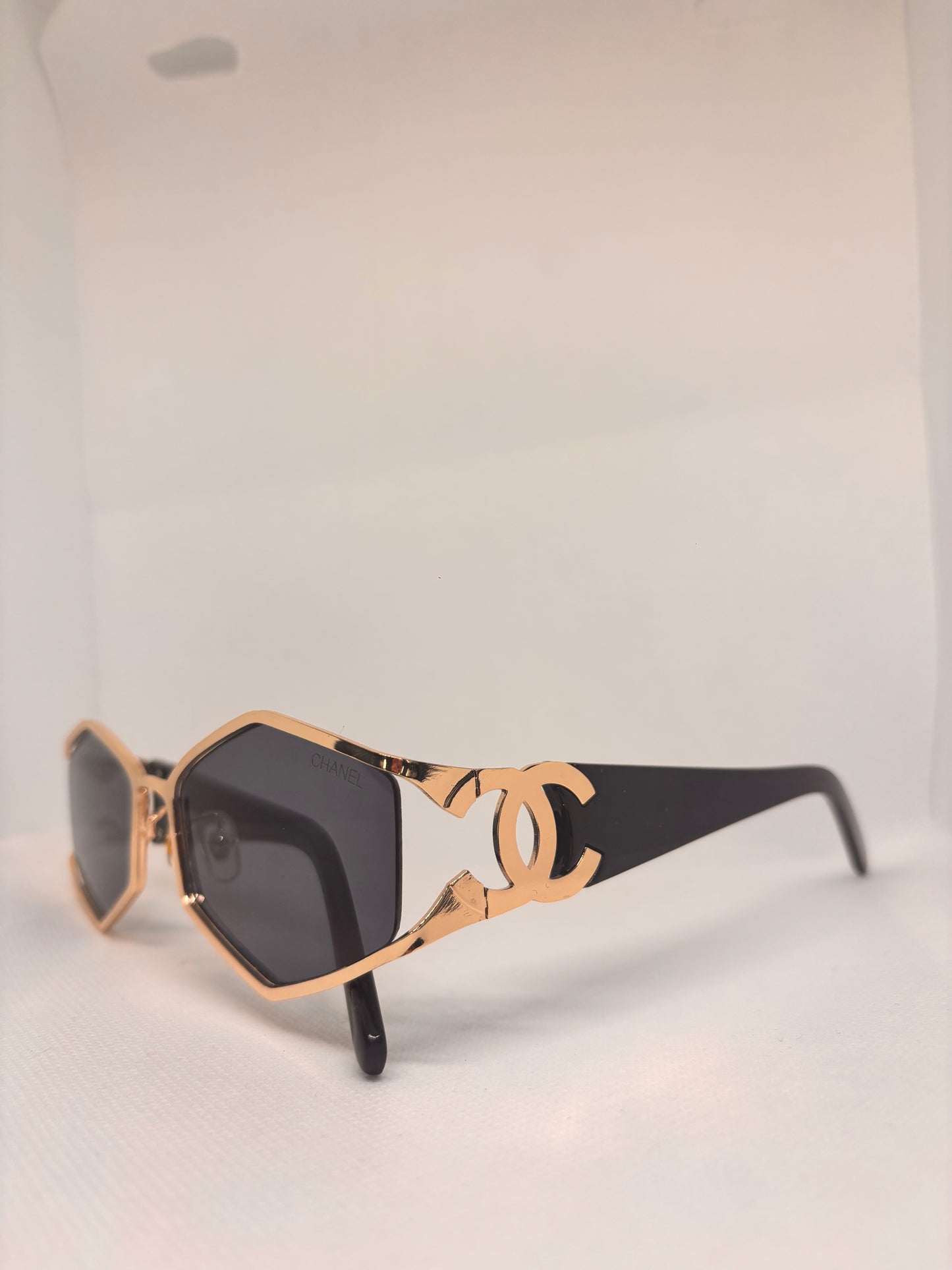 C BLACK AND GOLD SUNGLASSES