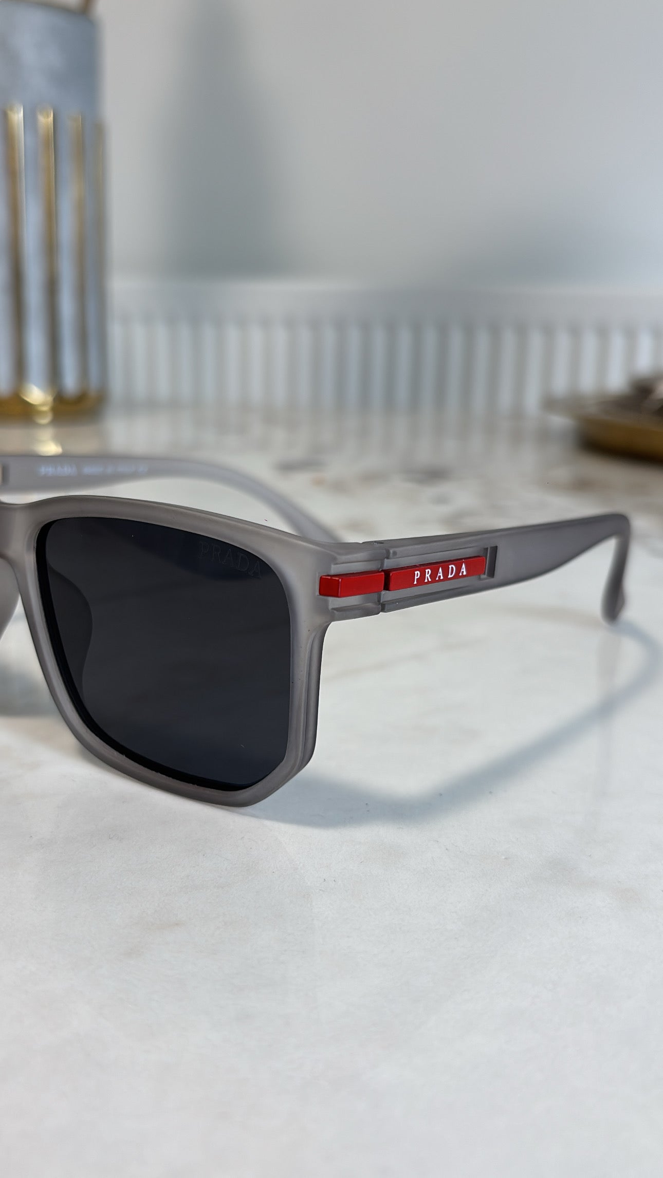 Men’s grey sunglasses