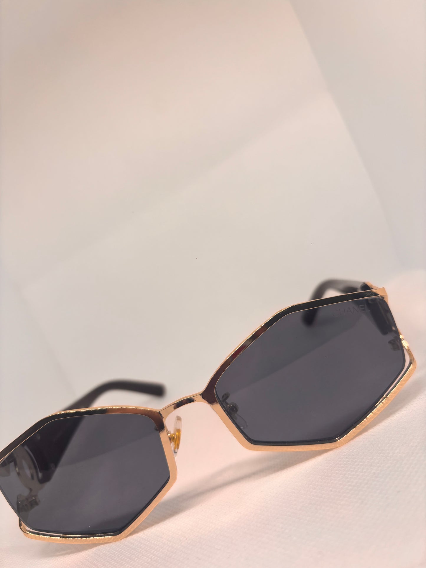 C BLACK AND GOLD SUNGLASSES