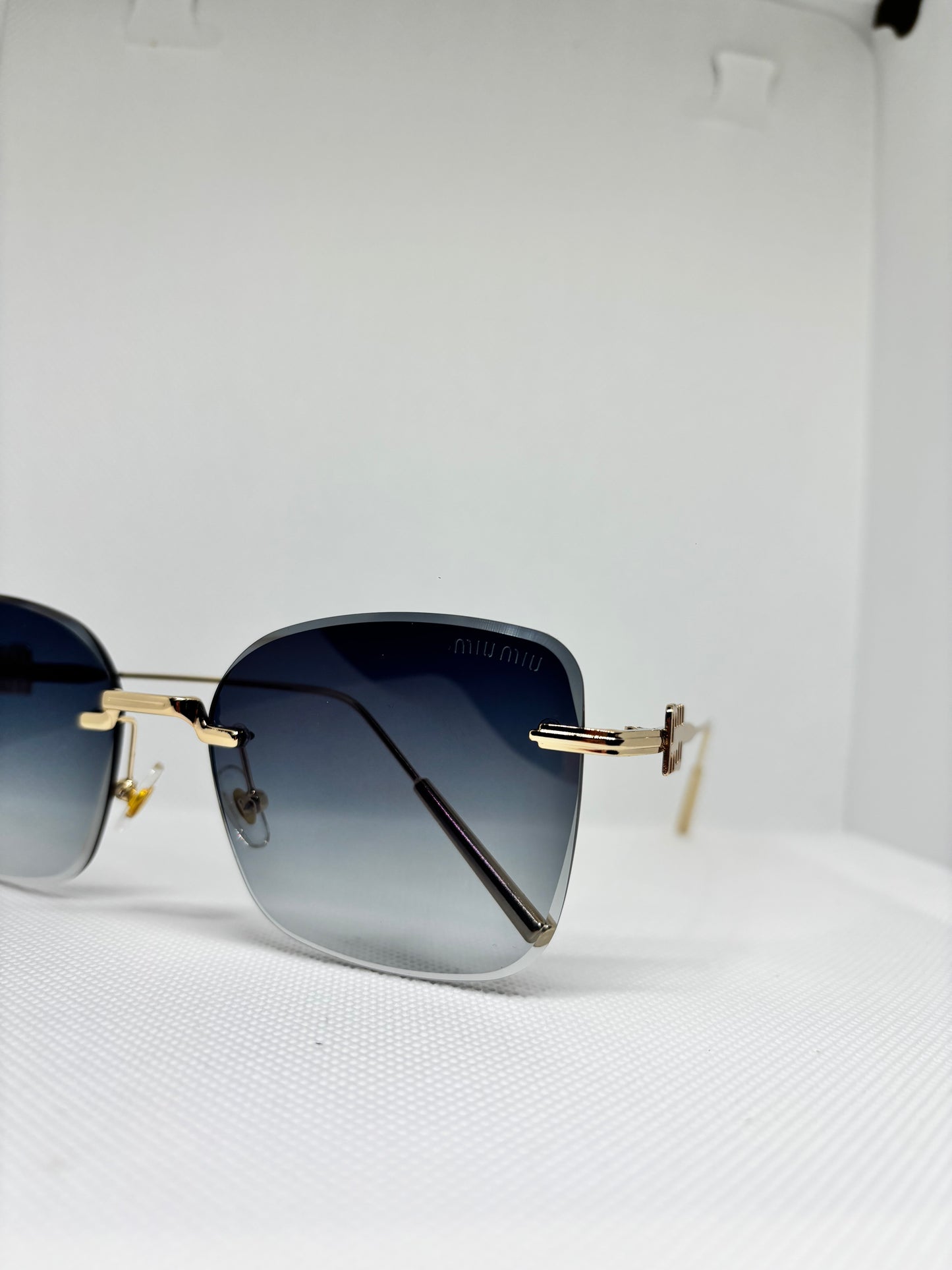 MIU BLUE SUNGLASSES