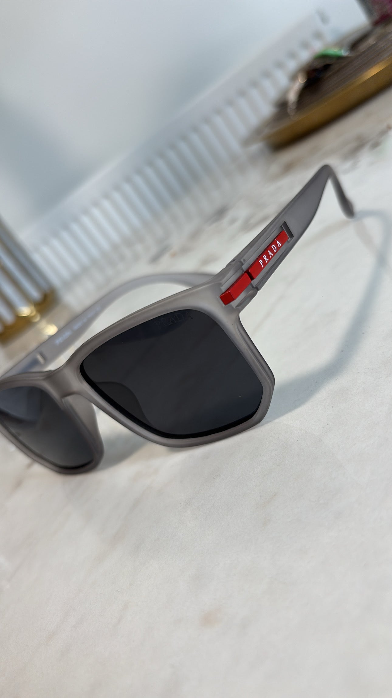Men’s grey sunglasses
